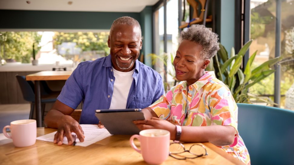 Couple looking at laptop